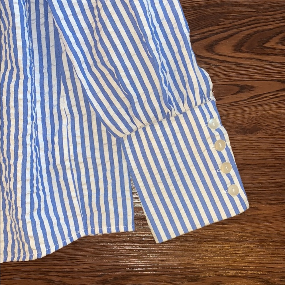 Blue and white top with vertical stripes